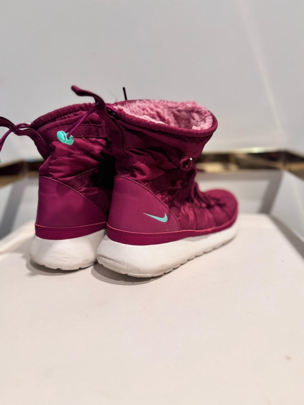 Nike Roshe Run high.